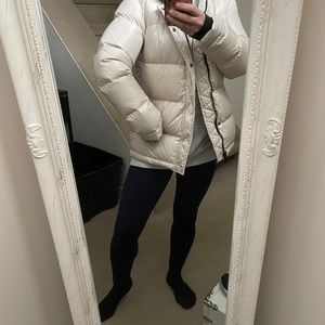 TNA original super puff matte pearl size XS.